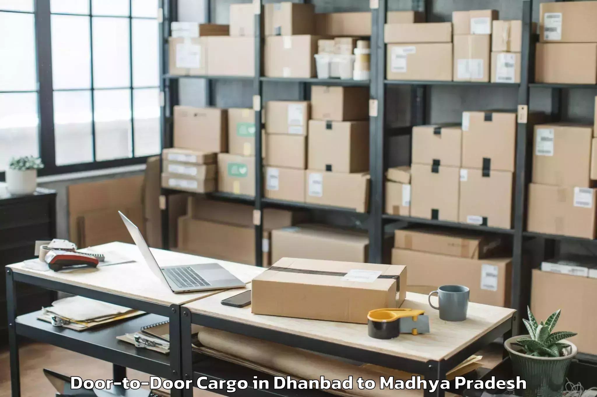 Easy Dhanbad to Dhamnod Door To Door Cargo Booking